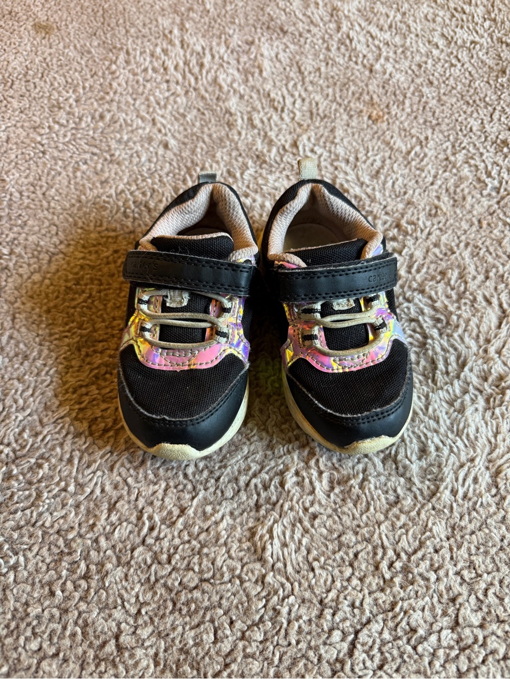 Toddler girl’s black and iridescent shoes, 6